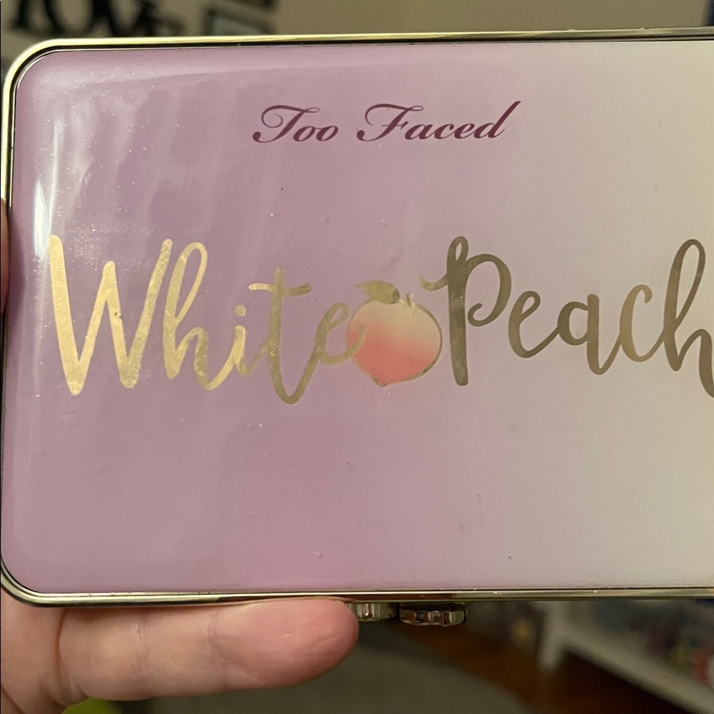 Two-faced white peach multi-dimensional eyeshadow palette.